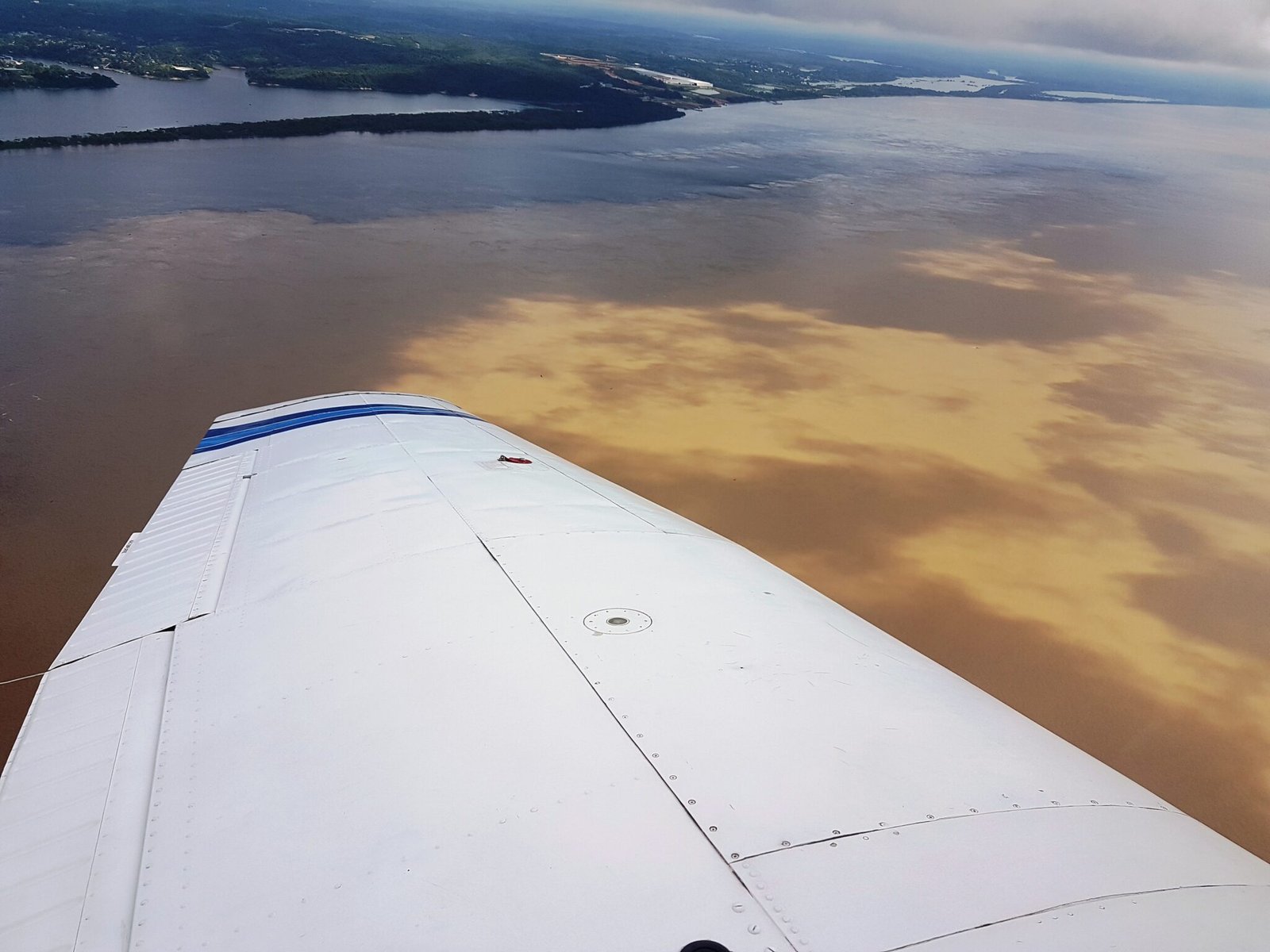 Aerial panoramic view over the Amazon rivers and canopy